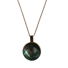 Load image into Gallery viewer, 18K gold plated over 925 sterling silver pendant and chain  Polish finish pendant 25mm from top to bottom, holding a faceted NZ Paua shell 19.5mm in diameter  Chain is adjustable from 40 to 46cm in length  Matching earrings available named &#39;Deco&#39; earrings
