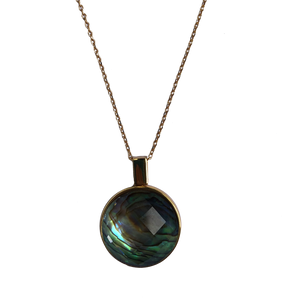 18K gold plated over 925 sterling silver pendant and chain  Polish finish pendant 25mm from top to bottom, holding a faceted NZ Paua shell 19.5mm in diameter  Chain is adjustable from 40 to 46cm in length  Matching earrings available named 'Deco' earrings