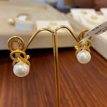 Load image into Gallery viewer, 18K gold plated over 925 sterling silver &quot;continental&quot; clasp style earrings  Satin finish earrings featuring White Freshwater Button shape pearls 9.5mm   Overall earring length of 20mm
