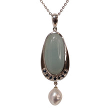 Load image into Gallery viewer, Australian south sea pearl pendant enhancer featuring a bezel set Cubic zirconia and a single Circle Button 13.1mm and SIlver Pink in color 
