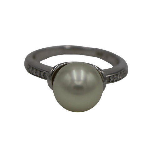 Australian South Sea pearl ring This ring is set in 925 sterling silver featuring a Round shape pearl, 10mm in size and White with subtle Cream hues in color, AAA grade The shoulders of this ring are set with Cubic Zirconia Size O1/2 (56) Rhodium coated for non-tarnish finish