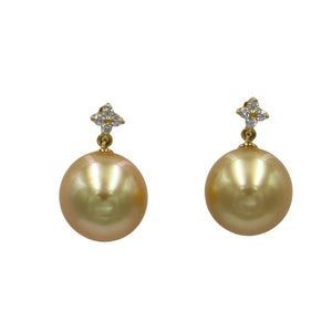 18ct Yellow Gold 'Stud' style earrings featuring stunning Golden South Sea Pearls, Round in shape and 10.3mm in size They are Deep Gold in color with "AAA" lustre and skin They feature eight diamonds with a total diamond weight TDW of 8= 0.083ct and GSI quality