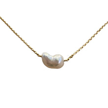 Load image into Gallery viewer, Australian South Sea pearl necklace on 9k yellow gold Oval belcher chain with a parrot clasp  This stunning necklace features an Australian South Sea natural seedless Keshi pearl , Baroque in shape, and 9 x 17mm in size. It is a high lustre pearl and is White with silver hues in color  The overall length is 40cm and the keshi weighs 1.5 grams  High lustre and AAA grade.
