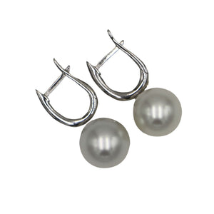 925 Sterling Silver Huggie earrings featuring Australian South Sea Pearls, that are Round in shape and 10.7mm in size They are White in color and are "AAA" lustre and skin