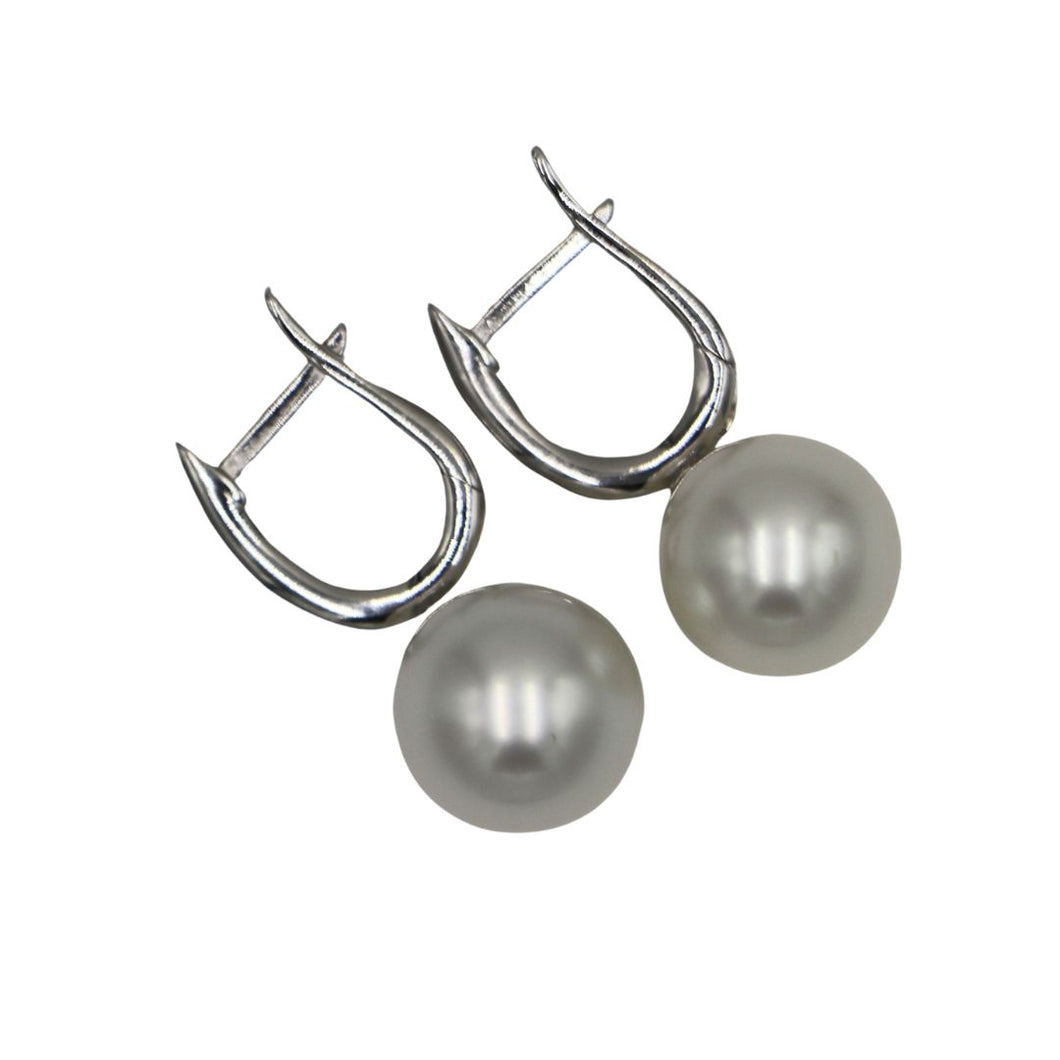 925 Sterling Silver Huggie earrings featuring Australian South Sea Pearls, that are Round in shape and 10.7mm in size They are White in color and are 
