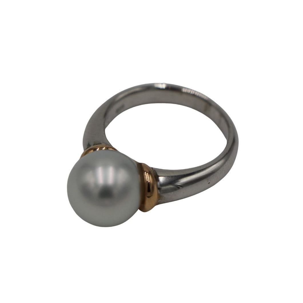 Australian South Sea pearl ring This ring is set in a two tone setting of 925 sterling silver and 9ct Rose Gold. It features a Round shape pearl, 11.2mm in size and White with a Silver hues in color, AAA grade Size P (57) Rhodium coated for non-tarnish finish