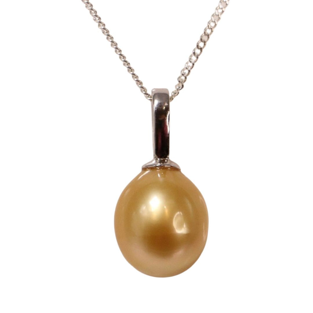 South Sea pearl pendant featuring an Oval shape pearl 13.4 x 15.5mm in size and Deep Gold in color. The pearl is set in 925 sterling silver pendant Chain included is Base metal only
