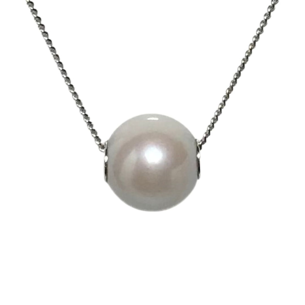 Sterling silver necklace featuring freshwater pearl, White , Round, 9.9mm with sterling silver end caps and chain, adjustable length