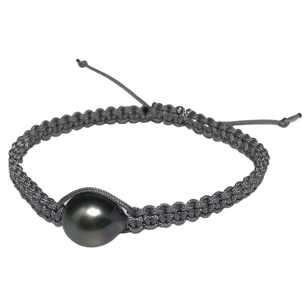 Macrame bracelet featuring a Tahitian South Sea Pearl, Baroque shape, 11.5 x 14.5mm in size, natural Green in color               (J2617)  Bracelet made from water and color fast nylon material made for heavy duty wear and tear.